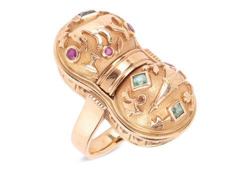 Lot 160 - A stylised gem set ring, of double bombe...