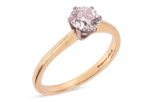 Lot 175 - A single stone diamond ring, with a round...