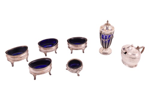 Lot 316 - A set of four George III silver salt cellars,...