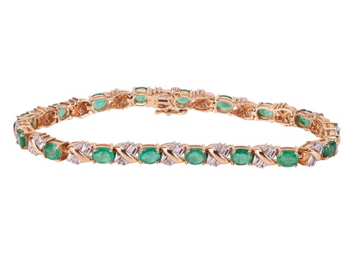 Lot 141 - A fracture-filled emerald and diamond line...