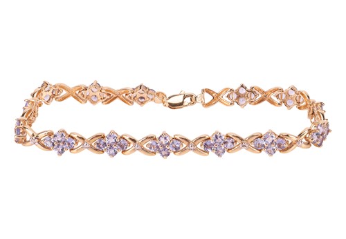 Lot 113 - A tanzanite-set bracelet, composed of clusters...