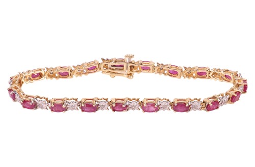 Lot 149 - A gem-set bracelet, composed of oval mixed-cut...