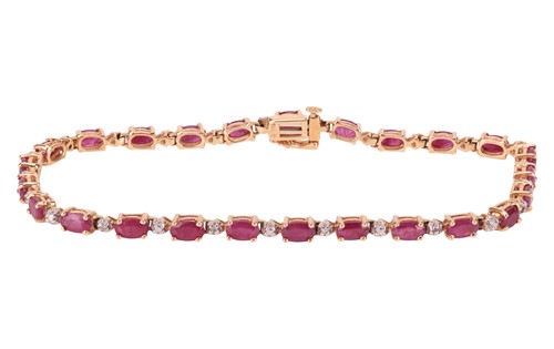 Lot 96 - A fracture-filled ruby bracelet, composed of...