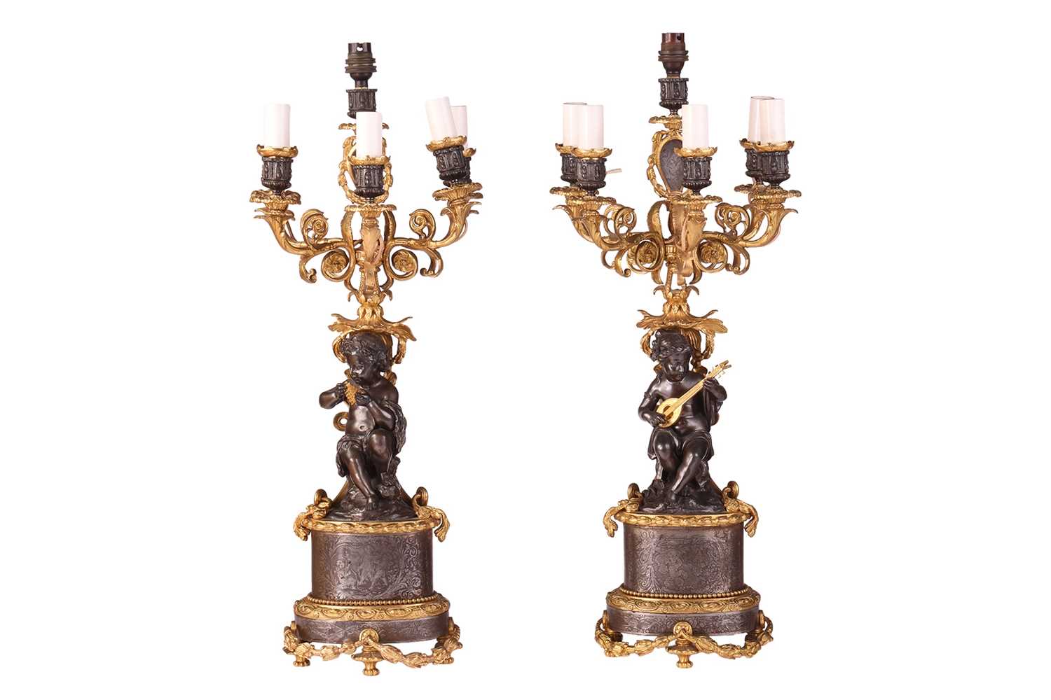 Lot 78 - A pair of French Louis XVI-style patinated...