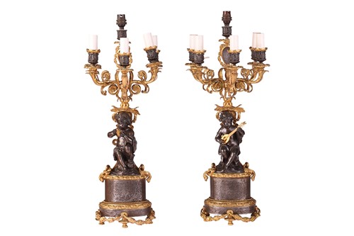 Lot 78 - A pair of French Louis XVI-style patinated...