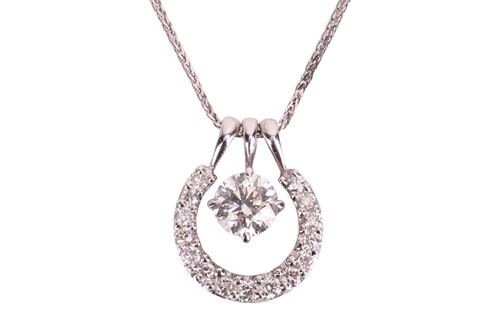 Lot 107 - A diamond-set horsehoe pendant necklace, set...
