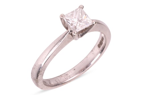 Lot 118 - A diamond single-stone ring, the four-claw set...