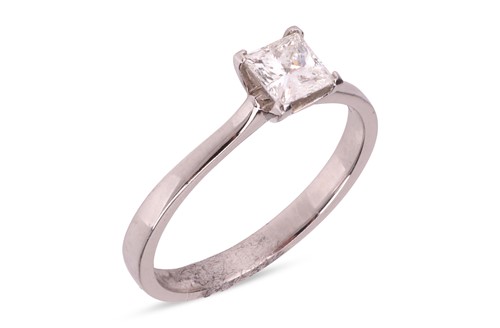 Lot 124 - A diamond single-stone ring, the four-claw set...