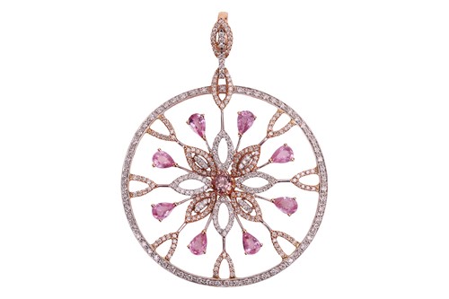 Lot 110 - A diamond and sapphire pendant, of open work...