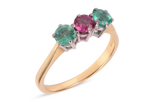 Lot 148 - An emerald and ruby three stone ring,...