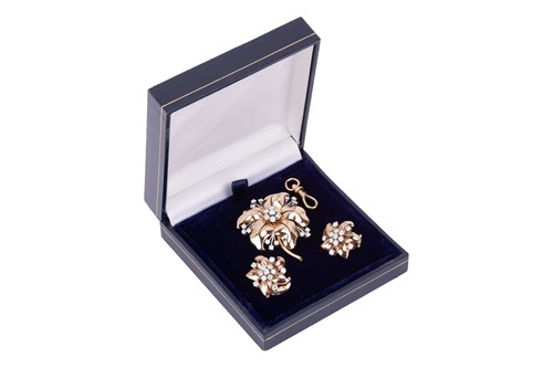Lot 74 - A Mid-Century diamond brooch and earring set,...