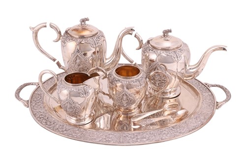 Lot 368 - A cased Thai ‘sterling silver’ four-piece tea...
