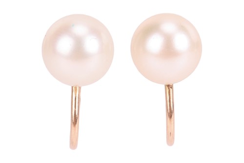 Lot 102 - A pair of pearl stud earrings, each earring...