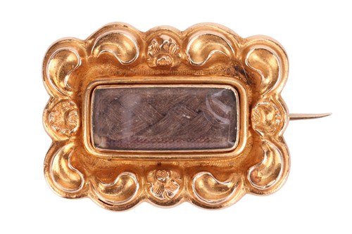 Lot 16 - An Early Victorian mourning fichu pin, of...