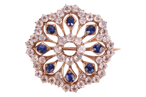 Lot 99 - A sapphire brooch/pendant, of openwork and...