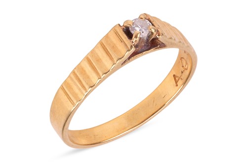 Lot 140 - A diamond single-stone ring, the four-claw set...