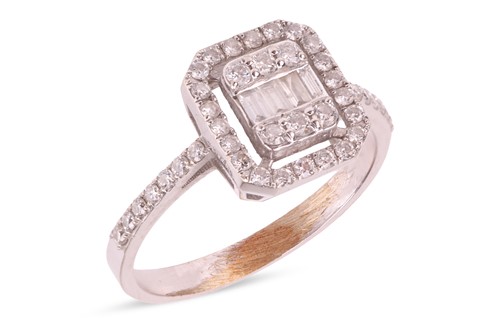 Lot 89 - A diamond cluster ring, illusion-set with...