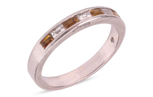 Lot 71 - A seven-stone sapphire and diamond ring,...