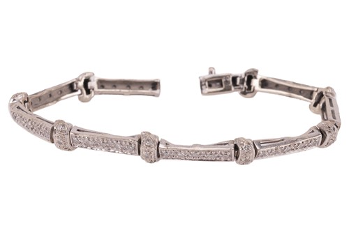 Lot 156 - A diamond-set bracelet, featuring rectangular...