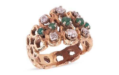 Lot 73 - A 1970s emerald and diamond ring, of abstract...