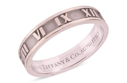 Lot 185 - Tiffany & Co. - An Atlas ring, the brushed...