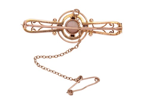 Lot 34 - An opal and diamond brooch, of openwork design,...