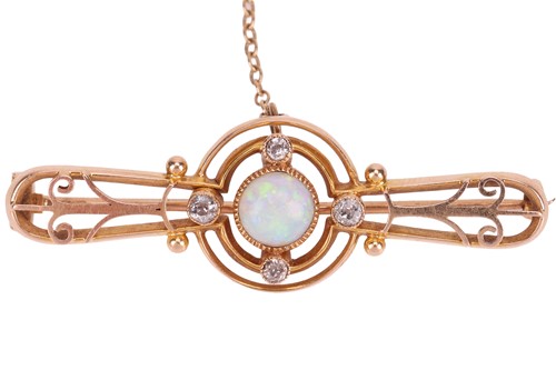 Lot 34 - An opal and diamond brooch, of openwork design,...