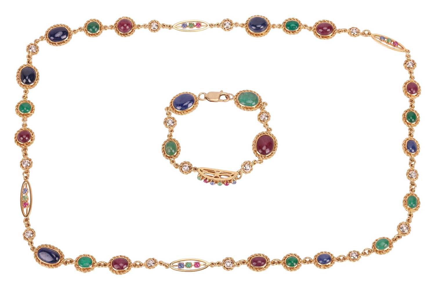 Lot 128 - A gem-set long necklace and matching bracelet,...