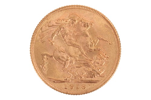 Lot 208 - A 1918 George V full sovereign, India mint,...