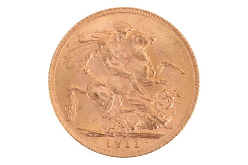 Lot 220 - A 1911 George V full sovereign, 8.0 grams.