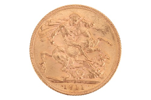 Lot 229 - A 1911 George V full sovereign, 8.0 grams.