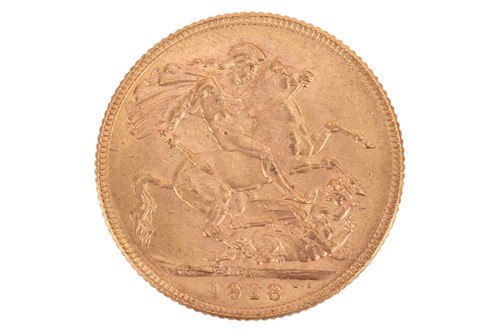Lot 209 - A 1918 George V full sovereign, 8.0 grams.