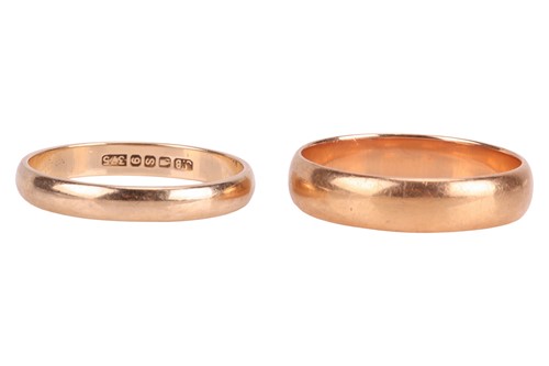 Lot 97 - Two court-style wedding bands; the wider band...