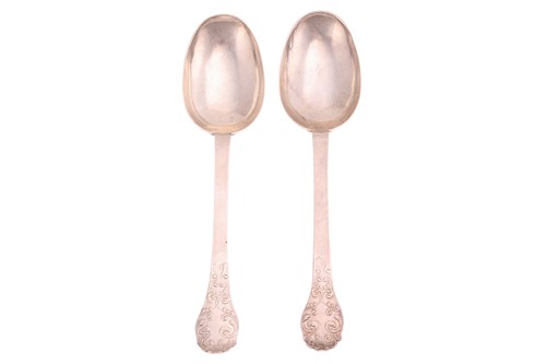Lot 281 - A pair of James II silver lace-back trefid...
