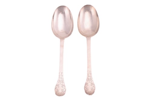 Lot 280 - A pair of James II silver lace-back trefid...