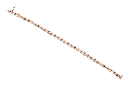 Lot 121 - A fancy link bracelet, comprising a series of...