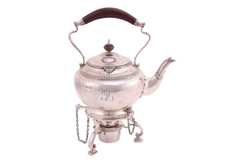 Lot 248 - A silver tea kettle on stand, London 1939, by...