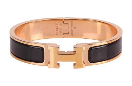 Lot 144 - Hermès - A Clic H bangle, the hinged bangle...