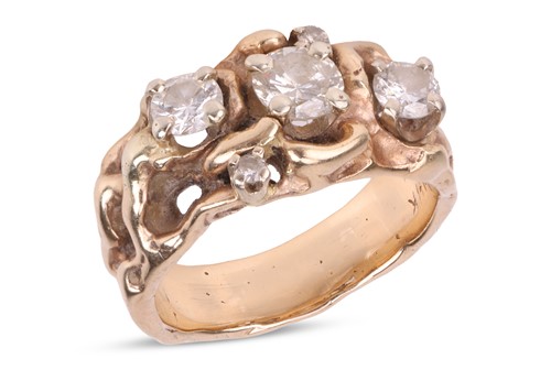 Lot 79 - An abstract diamond-set ring, featuring three...