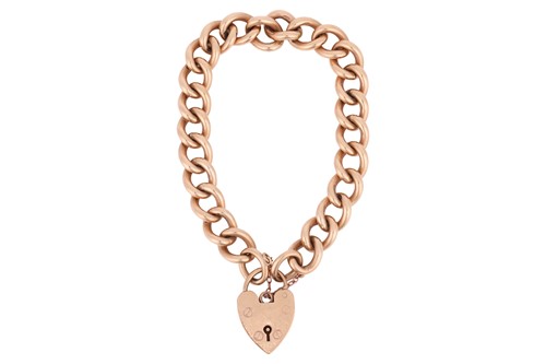 Lot 99 - A curb link bracelet, each link stamped '375',...