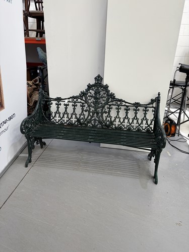 Lot 1 - A Coalbrookdale style green-painted cast iron...