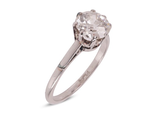 Lot 55 - An old-cut diamond solitaire ring, with an...