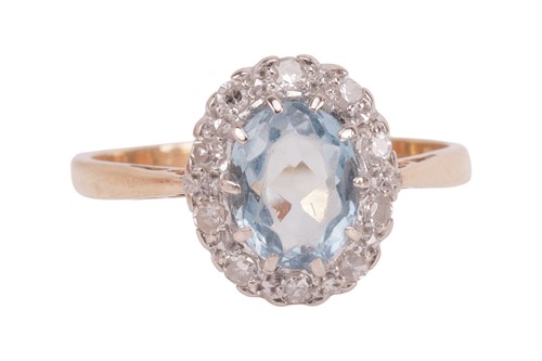Lot 159 - An aquamarine and diamond cluster ring,...