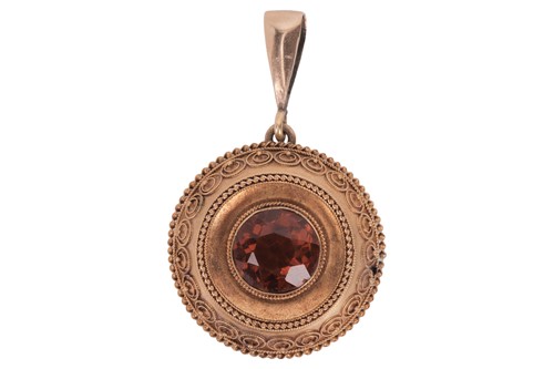 Lot 6 - An Etruscan Revival pendant set with citrine,...