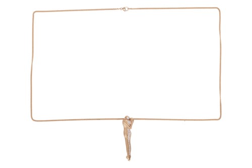 Lot 166 - A figural pendant/brooch on chain, the pendant...