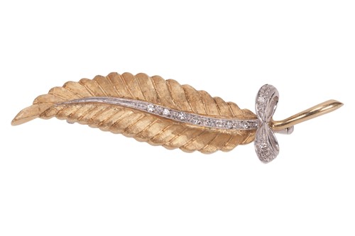Lot 80 - An 18ct diamond leaf brooch, the leaf with a...