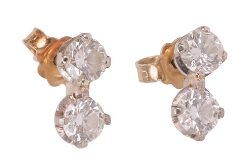 Lot 160 - A pair of diamond drop earrings, each...