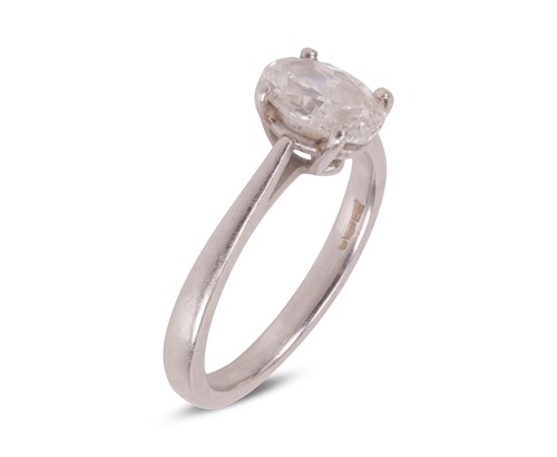 Lot 184 - A diamond solitaire ring, featuring a central...