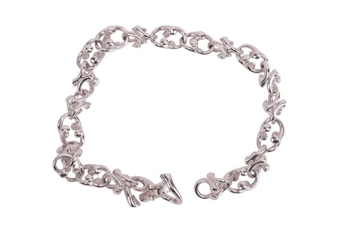 Lot 169 - Georg Jensen - A diamond-set ‘Magic’ link...