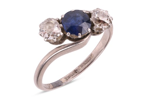 Lot 44 - A sapphire and diamond crossover ring,...